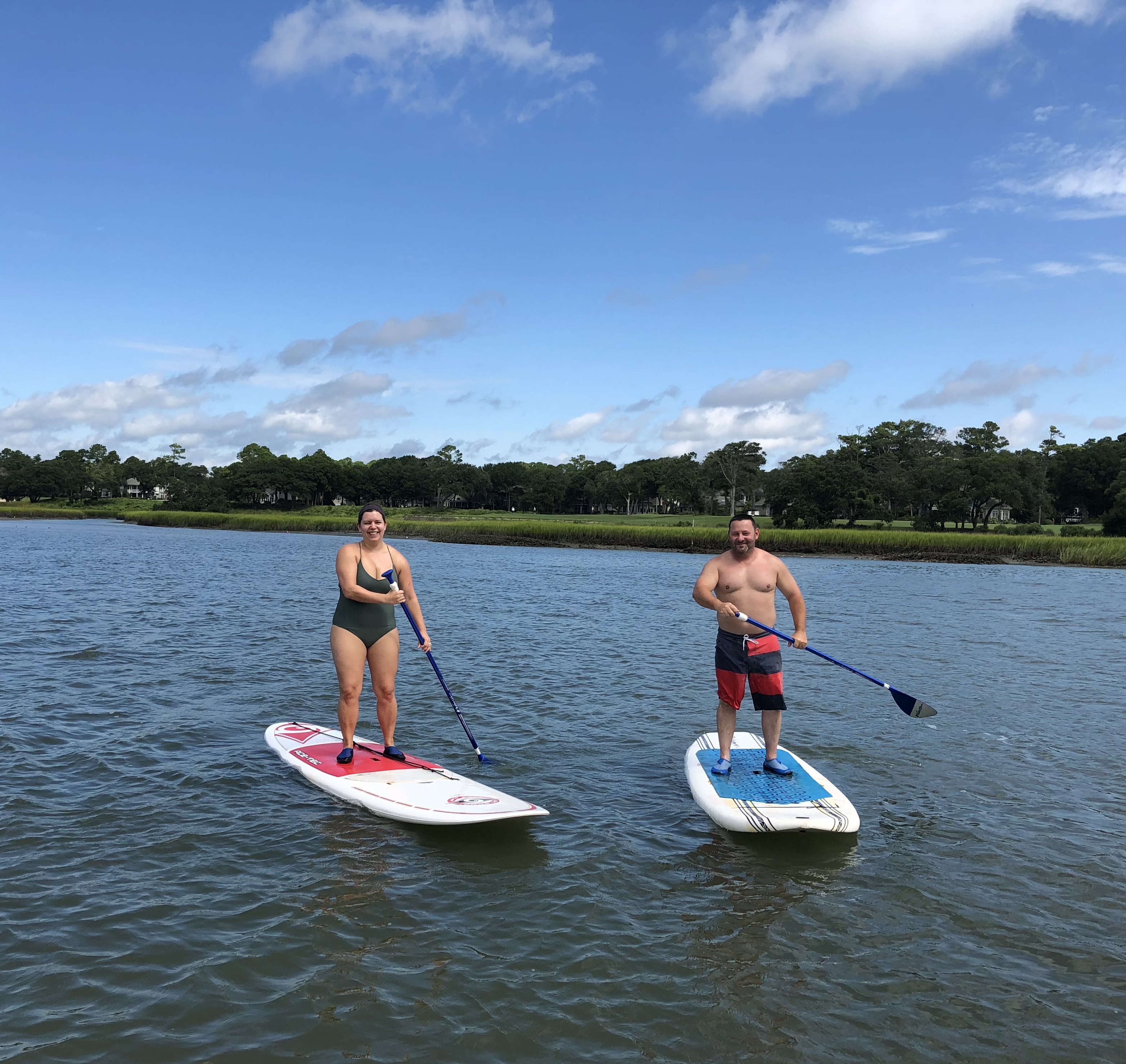Paddle boarding on the waterway at the beach.